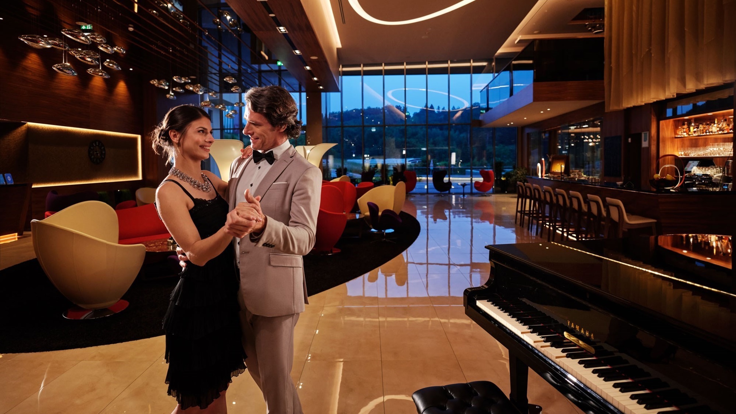 the couple dances at the Atlantida Hotel